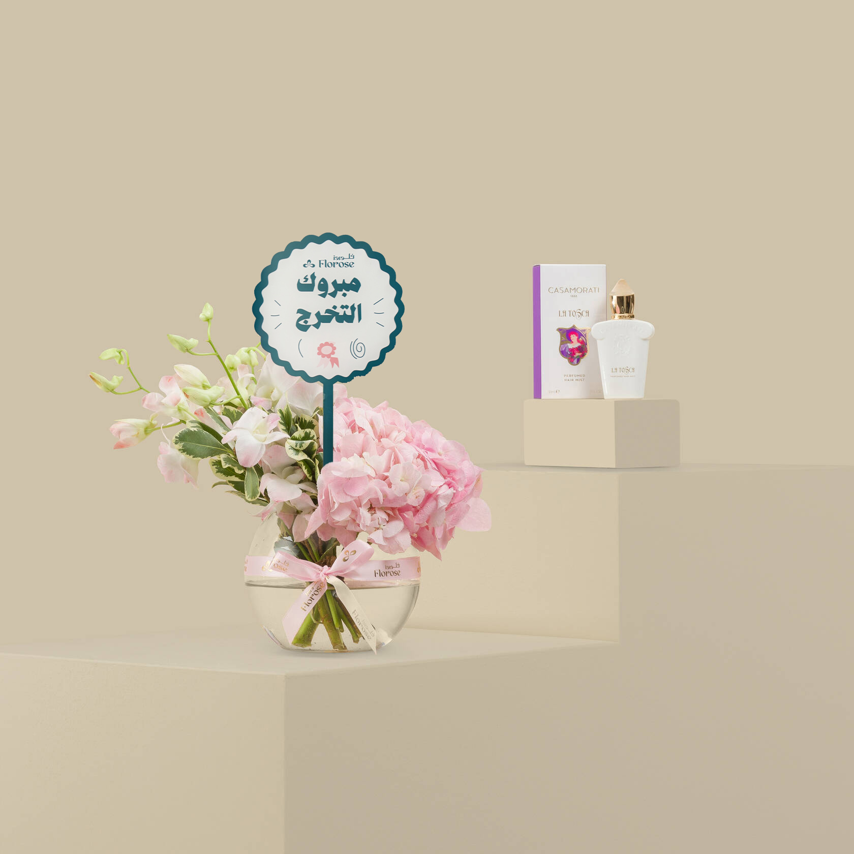 Casamorati La Tosca Hair Spray | Pink Shy Round Vase With Congratulation For Graduation Topper Casamorati La Tosca Hair Spray | Pink Shy Round Vase With Congratulation For Graduation Topper