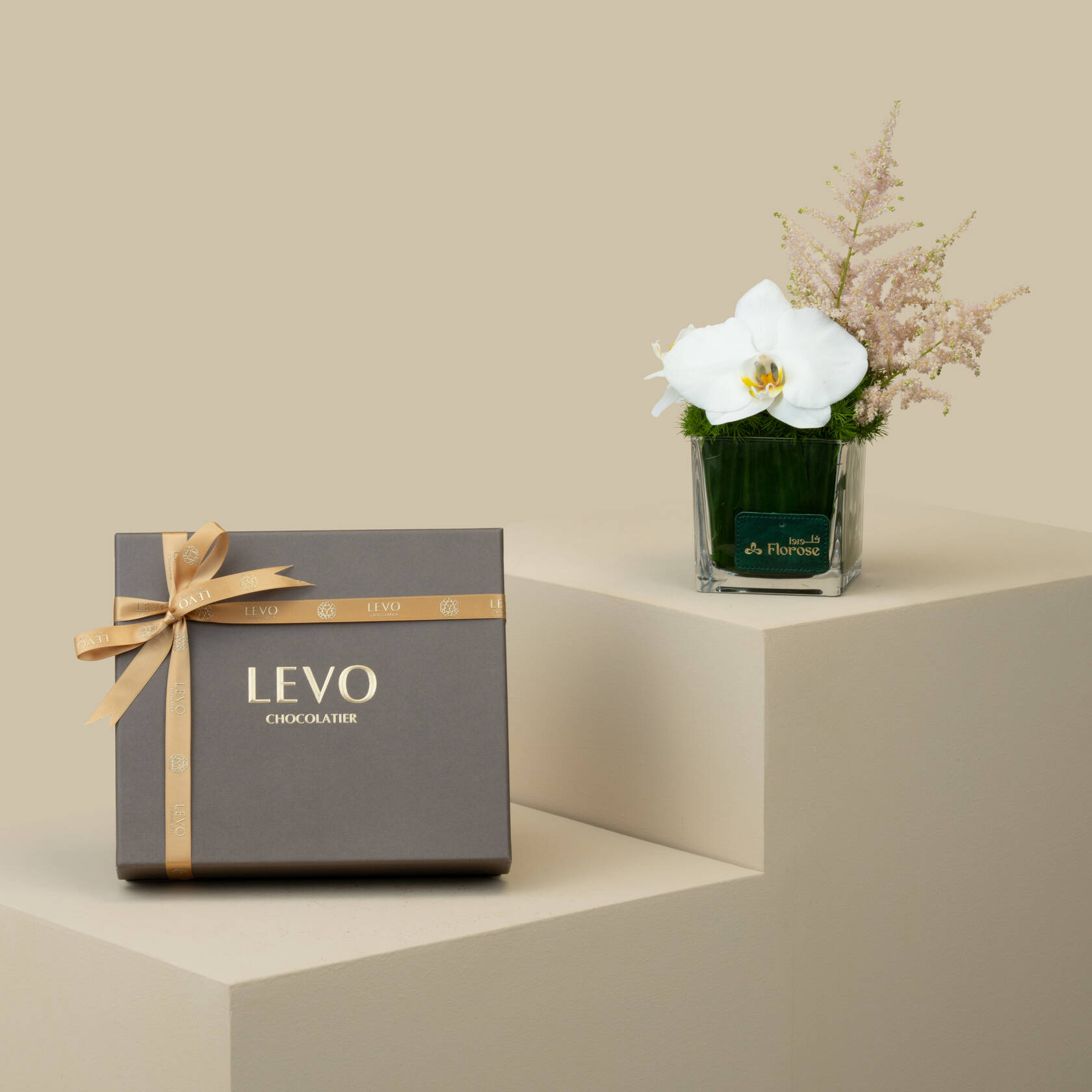 Levo | Crepe Dentelle Chocolate Medium Box 28 Pieces | Orchid Square Vase Levo | Crepe Dentelle Chocolate Medium Box 28 Pieces | Orchid Square Vase